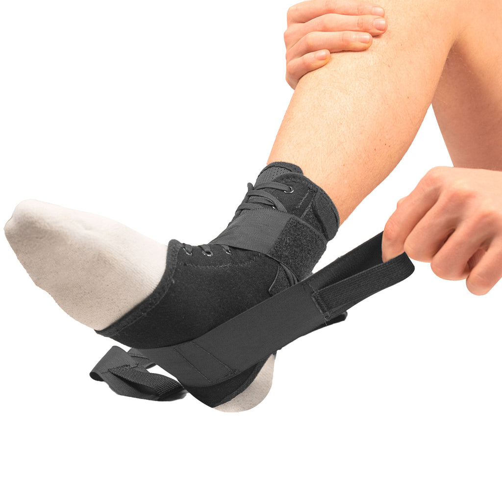 Model utilizing the heel lock while pulling the strap tight on 803 Speed Lacer Ankle Orthosis 