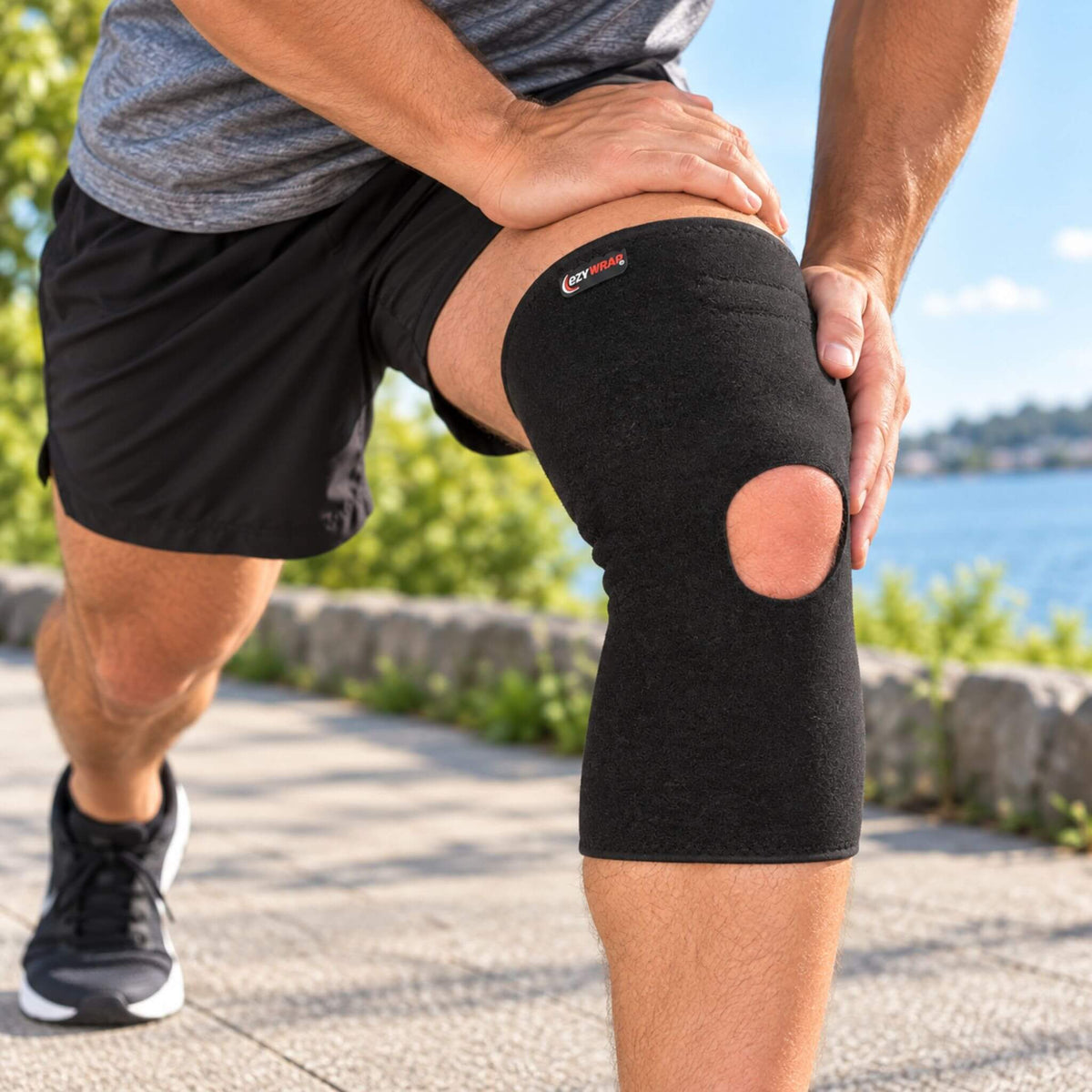 Man wearing a compression knee sleeve for support during outdoor activity